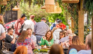 Guests having a cocktail outside