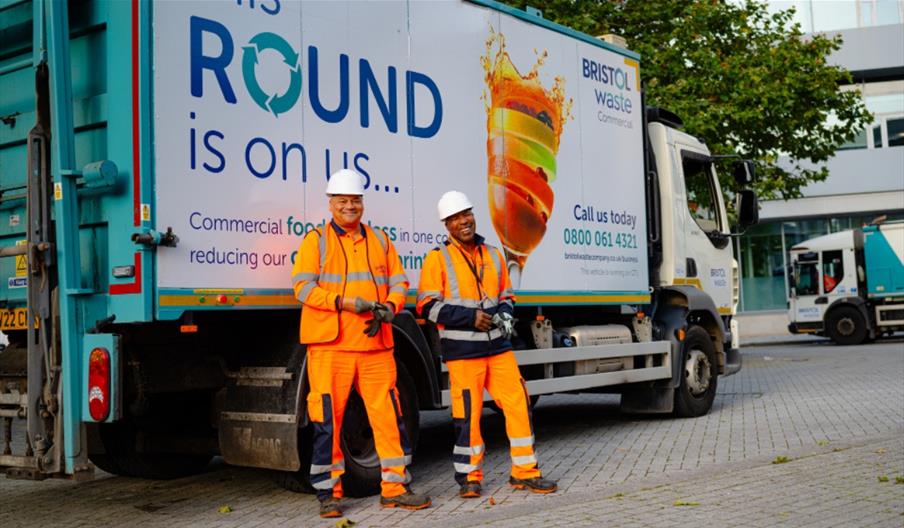 Bristol Waste Company waste management employees standing in front of their van.