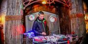 A DJ playing at a Christmas Party