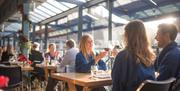 People dining inside at The Lido Restaurant